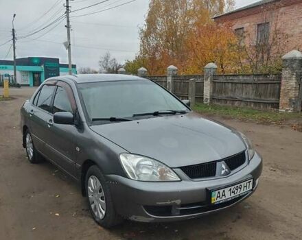 Сірий Міцубісі Lancer, об'ємом двигуна 1.58 л та пробігом 1 тис. км за 2850 $, фото 8 на Automoto.ua