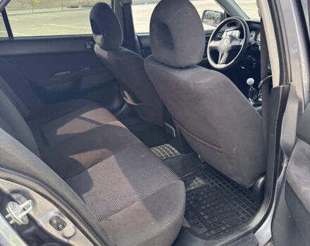 Серый Мицубиси Лансер, объемом двигателя 1.58 л и пробегом 250 тыс. км за 4300 $, фото 16 на Automoto.ua