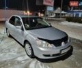 Сірий Міцубісі Lancer, об'ємом двигуна 1.58 л та пробігом 395 тис. км за 3700 $, фото 1 на Automoto.ua