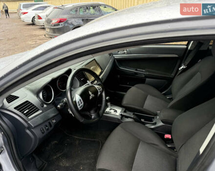 Серый Мицубиси Лансер, объемом двигателя 2 л и пробегом 265 тыс. км за 5200 $, фото 9 на Automoto.ua