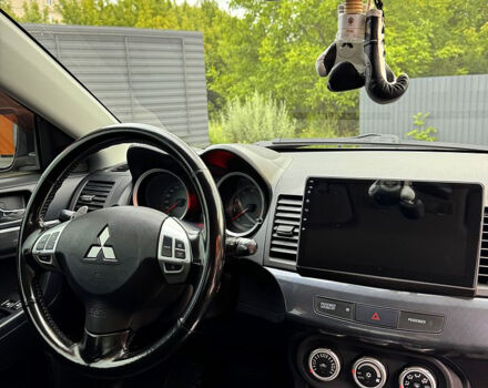 Сірий Міцубісі Lancer, об'ємом двигуна 2 л та пробігом 180 тис. км за 7600 $, фото 7 на Automoto.ua