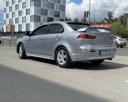 Серый Мицубиси Лансер, объемом двигателя 2 л и пробегом 265 тыс. км за 5500 $, фото 10 на Automoto.ua