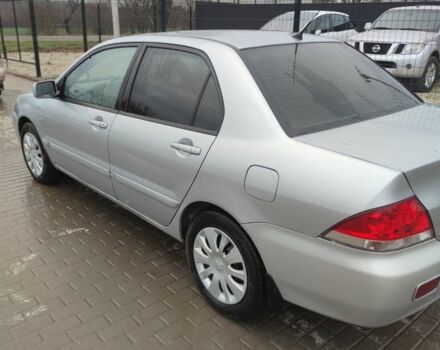 Серый Мицубиси Лансер, объемом двигателя 1.6 л и пробегом 225 тыс. км за 3100 $, фото 3 на Automoto.ua