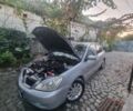 Серый Мицубиси Лансер, объемом двигателя 1.6 л и пробегом 290 тыс. км за 4100 $, фото 10 на Automoto.ua
