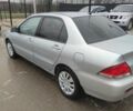 Серый Мицубиси Лансер, объемом двигателя 1.6 л и пробегом 225 тыс. км за 3100 $, фото 3 на Automoto.ua