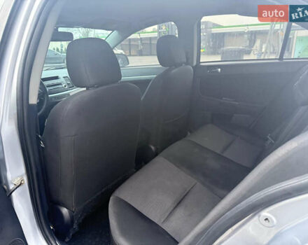 Серый Мицубиси Лансер, объемом двигателя 2 л и пробегом 220 тыс. км за 6500 $, фото 7 на Automoto.ua