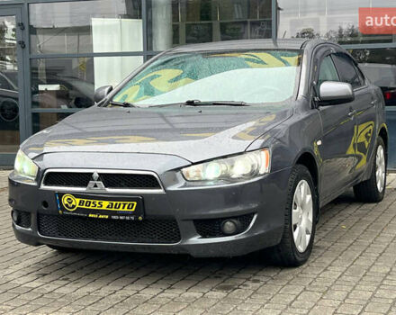 Серый Мицубиси Лансер, объемом двигателя 1.5 л и пробегом 239 тыс. км за 6000 $, фото 2 на Automoto.ua
