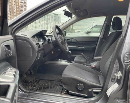 Серый Мицубиси Лансер, объемом двигателя 1.6 л и пробегом 146 тыс. км за 5990 $, фото 7 на Automoto.ua