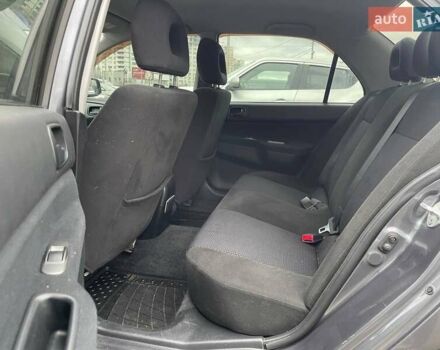 Серый Мицубиси Лансер, объемом двигателя 1.58 л и пробегом 146 тыс. км за 5490 $, фото 9 на Automoto.ua