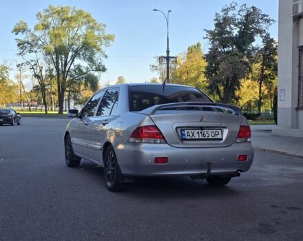 Серый Мицубиси Лансер, объемом двигателя 1.6 л и пробегом 150 тыс. км за 4700 $, фото 3 на Automoto.ua