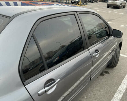 Серый Мицубиси Лансер, объемом двигателя 1.58 л и пробегом 183 тыс. км за 3800 $, фото 22 на Automoto.ua