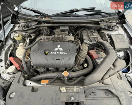 Сірий Міцубісі Lancer, об'ємом двигуна 2 л та пробігом 253 тис. км за 8700 $, фото 49 на Automoto.ua