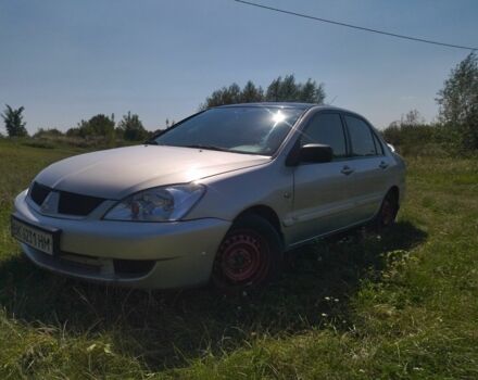 Серый Мицубиси Лансер, объемом двигателя 1.6 л и пробегом 350 тыс. км за 3600 $, фото 7 на Automoto.ua