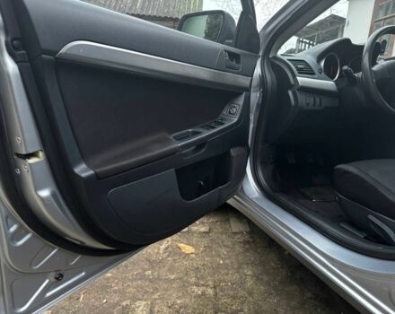 Серый Мицубиси Лансер, объемом двигателя 1.5 л и пробегом 147 тыс. км за 6700 $, фото 12 на Automoto.ua