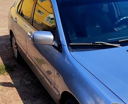 Серый Мицубиси Лансер, объемом двигателя 1.6 л и пробегом 212 тыс. км за 4000 $, фото 2 на Automoto.ua