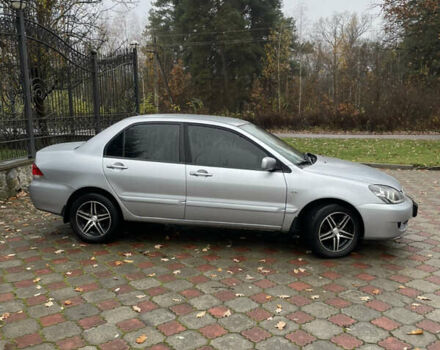 Сірий Міцубісі Lancer, об'ємом двигуна 1.59 л та пробігом 219 тис. км за 4500 $, фото 4 на Automoto.ua