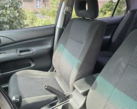 Сірий Міцубісі Lancer, об'ємом двигуна 1.58 л та пробігом 298 тис. км за 3400 $, фото 8 на Automoto.ua