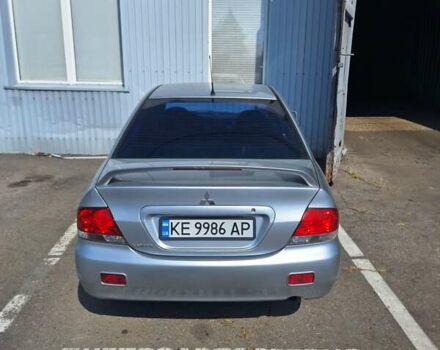 Сірий Міцубісі Lancer, об'ємом двигуна 1.6 л та пробігом 217 тис. км за 6000 $, фото 5 на Automoto.ua