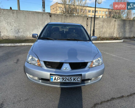 Серый Мицубиси Лансер, объемом двигателя 1.6 л и пробегом 193 тыс. км за 4000 $, фото 1 на Automoto.ua
