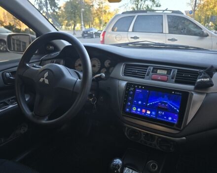 Серый Мицубиси Лансер, объемом двигателя 1.6 л и пробегом 150 тыс. км за 4700 $, фото 6 на Automoto.ua