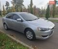 Серый Мицубиси Лансер, объемом двигателя 1.5 л и пробегом 235 тыс. км за 5450 $, фото 1 на Automoto.ua