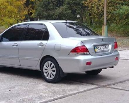 Сірий Міцубісі Lancer, об'ємом двигуна 1.6 л та пробігом 176 тис. км за 4999 $, фото 10 на Automoto.ua
