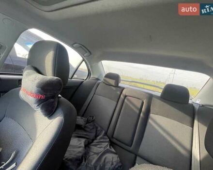 Сірий Міцубісі Lancer, об'ємом двигуна 2 л та пробігом 92 тис. км за 7700 $, фото 2 на Automoto.ua