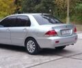 Сірий Міцубісі Lancer, об'ємом двигуна 1.6 л та пробігом 176 тис. км за 4999 $, фото 10 на Automoto.ua