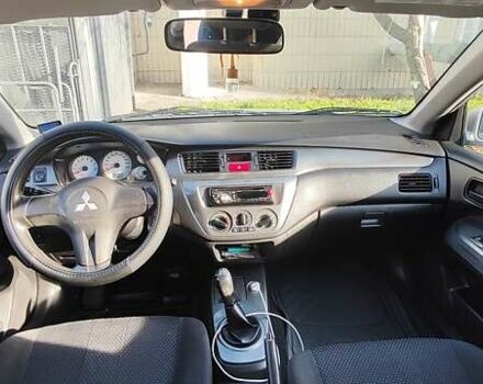 Серый Мицубиси Лансер, объемом двигателя 1.58 л и пробегом 216 тыс. км за 4700 $, фото 6 на Automoto.ua