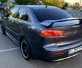 Сірий Міцубісі Lancer, об'ємом двигуна 2 л та пробігом 233 тис. км за 7450 $, фото 1 на Automoto.ua