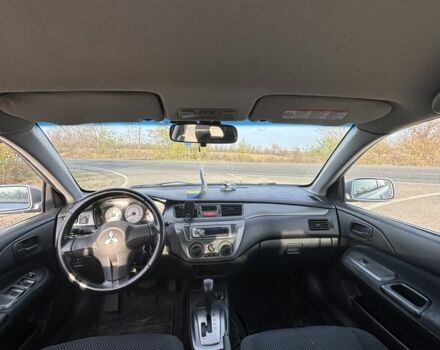 Серый Мицубиси Лансер, объемом двигателя 1.6 л и пробегом 228 тыс. км за 4500 $, фото 4 на Automoto.ua