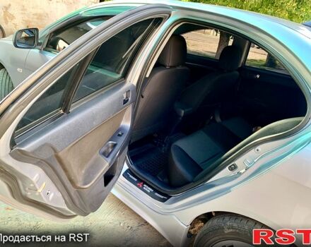 Серый Мицубиси Лансер, объемом двигателя 2 л и пробегом 175 тыс. км за 6800 $, фото 8 на Automoto.ua