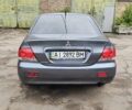 Сірий Міцубісі Lancer, об'ємом двигуна 1.58 л та пробігом 200 тис. км за 1700 $, фото 4 на Automoto.ua