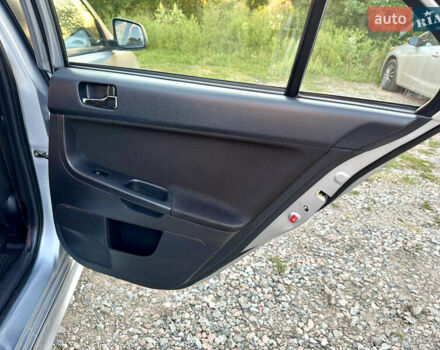 Сірий Міцубісі Lancer, об'ємом двигуна 2 л та пробігом 223 тис. км за 7390 $, фото 16 на Automoto.ua