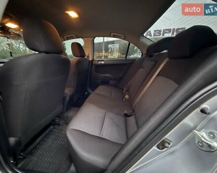 Сірий Міцубісі Lancer, об'ємом двигуна 2 л та пробігом 280 тис. км за 6999 $, фото 12 на Automoto.ua