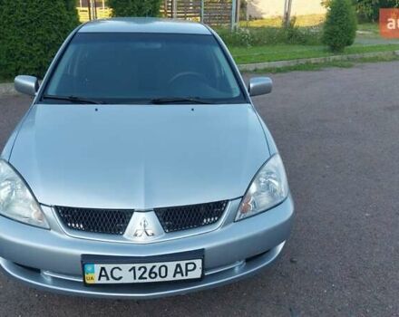 Серый Мицубиси Лансер, объемом двигателя 1.6 л и пробегом 117 тыс. км за 3980 $, фото 1 на Automoto.ua