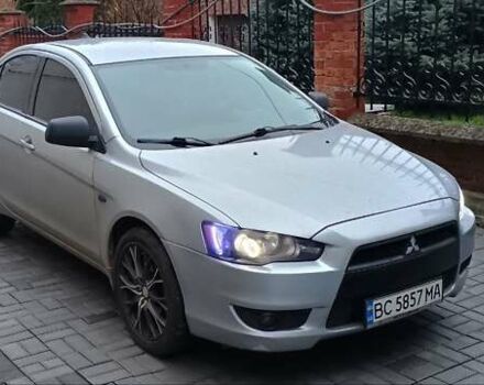 Серый Мицубиси Лансер, объемом двигателя 1.5 л и пробегом 230 тыс. км за 6300 $, фото 1 на Automoto.ua