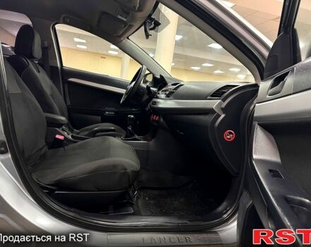 Серый Мицубиси Лансер, объемом двигателя 1.5 л и пробегом 241 тыс. км за 6400 $, фото 6 на Automoto.ua