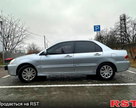 Серый Мицубиси Лансер, объемом двигателя 1.6 л и пробегом 165 тыс. км за 4000 $, фото 11 на Automoto.ua