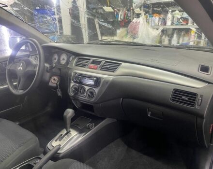 Серый Мицубиси Лансер, объемом двигателя 1.6 л и пробегом 100 тыс. км за 2500 $, фото 3 на Automoto.ua