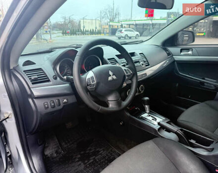 Серый Мицубиси Лансер, объемом двигателя 2 л и пробегом 220 тыс. км за 6500 $, фото 6 на Automoto.ua