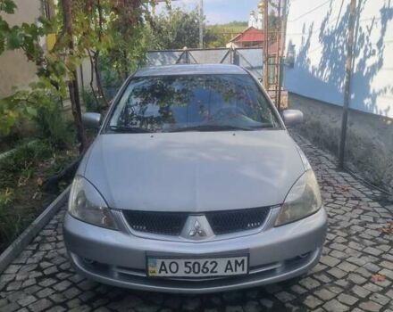 Сірий Міцубісі Lancer, об'ємом двигуна 1.6 л та пробігом 290 тис. км за 3850 $, фото 15 на Automoto.ua
