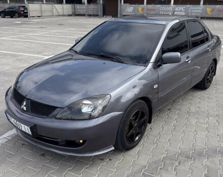 Серый Мицубиси Лансер, объемом двигателя 1.58 л и пробегом 250 тыс. км за 4300 $, фото 14 на Automoto.ua