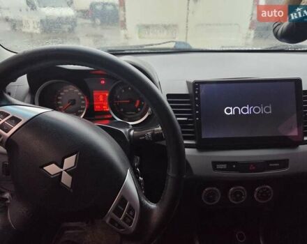 Серый Мицубиси Лансер, объемом двигателя 2 л и пробегом 175 тыс. км за 6500 $, фото 1 на Automoto.ua