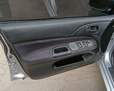 Серый Мицубиси Лансер, объемом двигателя 1.58 л и пробегом 176 тыс. км за 5000 $, фото 23 на Automoto.ua