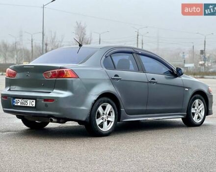 Серый Мицубиси Лансер, объемом двигателя 2 л и пробегом 203 тыс. км за 4999 $, фото 5 на Automoto.ua