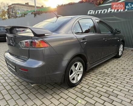 Серый Мицубиси Лансер, объемом двигателя 2 л и пробегом 230 тыс. км за 6900 $, фото 25 на Automoto.ua