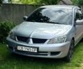 Сірий Міцубісі Lancer, об'ємом двигуна 1.6 л та пробігом 173 тис. км за 3500 $, фото 1 на Automoto.ua