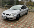 Сірий Міцубісі Lancer, об'ємом двигуна 1.59 л та пробігом 219 тис. км за 4500 $, фото 9 на Automoto.ua
