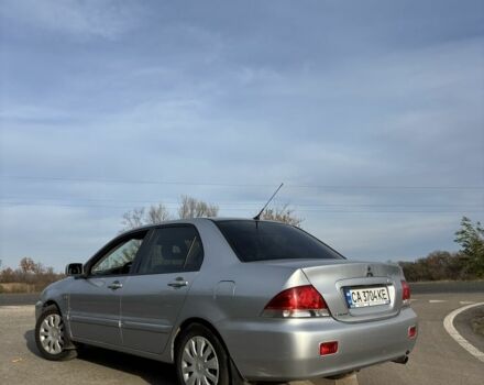 Серый Мицубиси Лансер, объемом двигателя 1.6 л и пробегом 228 тыс. км за 4500 $, фото 3 на Automoto.ua